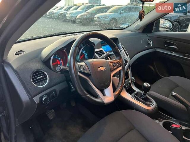 Черный Шевроле Круз, объемом двигателя 1.4 л и пробегом 172 тыс. км за 6990 $, фото 14 на Automoto.ua