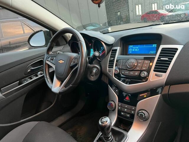 Черный Шевроле Круз, объемом двигателя 1.4 л и пробегом 172 тыс. км за 6990 $, фото 35 на Automoto.ua