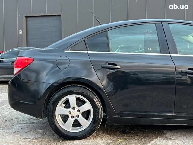 Черный Шевроле Круз, объемом двигателя 1.4 л и пробегом 172 тыс. км за 6990 $, фото 7 на Automoto.ua