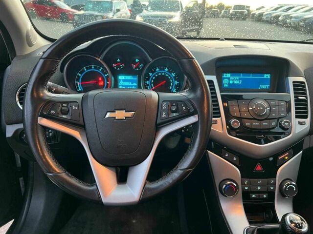 Черный Шевроле Круз, объемом двигателя 1.4 л и пробегом 172 тыс. км за 6990 $, фото 19 на Automoto.ua