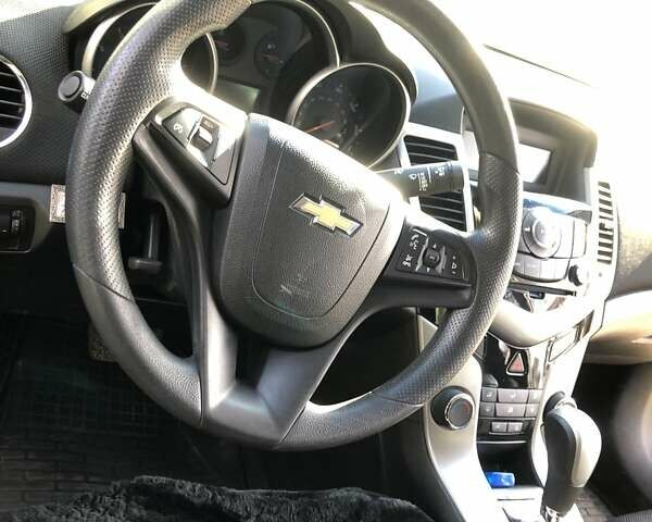 Чорний Шевроле Круз, об'ємом двигуна 1.36 л та пробігом 267 тис. км за 7400 $, фото 5 на Automoto.ua