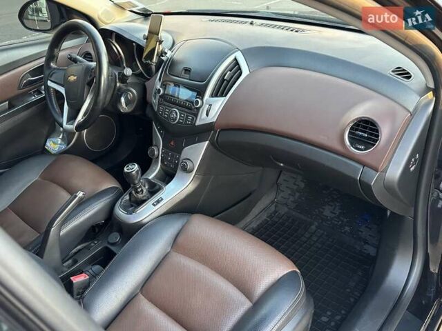 Черный Шевроле Круз, объемом двигателя 1.69 л и пробегом 208 тыс. км за 7400 $, фото 5 на Automoto.ua