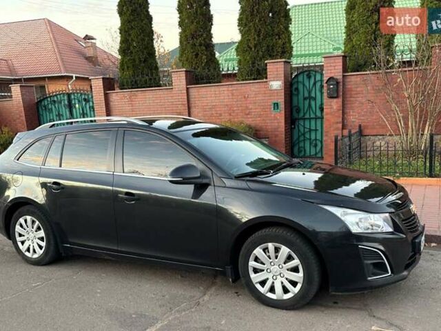 Черный Шевроле Круз, объемом двигателя 1.69 л и пробегом 208 тыс. км за 7400 $, фото 2 на Automoto.ua