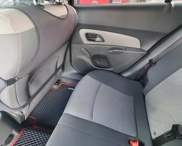 Червоний Шевроле Круз, об'ємом двигуна 1.6 л та пробігом 240 тис. км за 6300 $, фото 17 на Automoto.ua