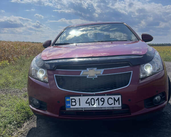 Красный Шевроле Круз, объемом двигателя 1.99 л и пробегом 181 тыс. км за 9000 $, фото 2 на Automoto.ua