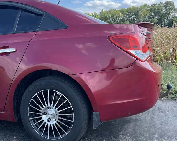 Красный Шевроле Круз, объемом двигателя 1.99 л и пробегом 181 тыс. км за 9000 $, фото 14 на Automoto.ua