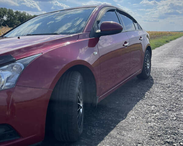 Красный Шевроле Круз, объемом двигателя 1.99 л и пробегом 181 тыс. км за 9000 $, фото 16 на Automoto.ua