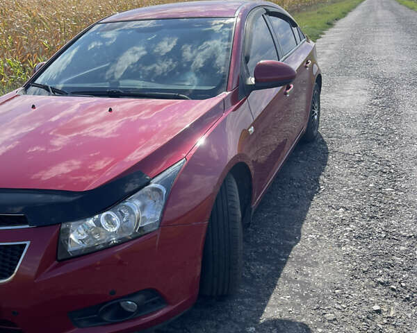 Красный Шевроле Круз, объемом двигателя 1.99 л и пробегом 181 тыс. км за 9000 $, фото 17 на Automoto.ua