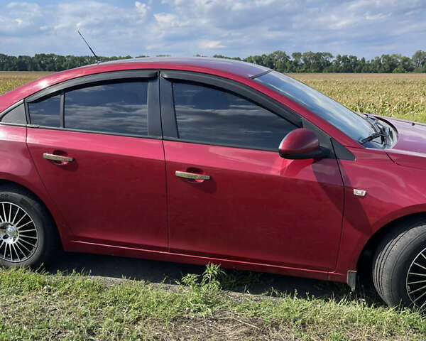 Красный Шевроле Круз, объемом двигателя 1.99 л и пробегом 181 тыс. км за 9000 $, фото 5 на Automoto.ua