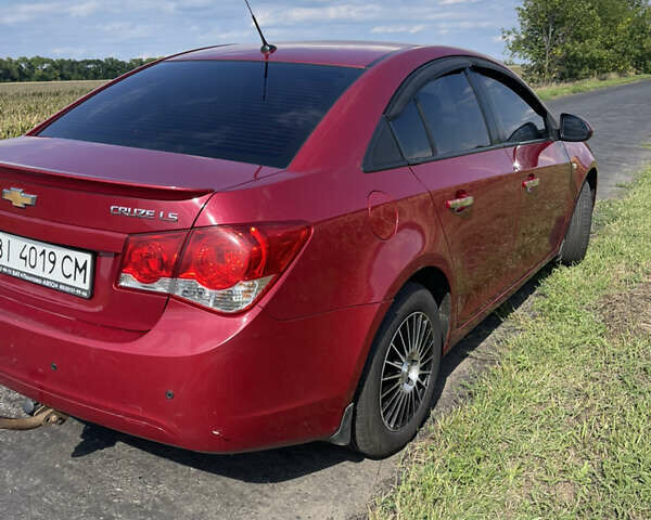 Красный Шевроле Круз, объемом двигателя 1.99 л и пробегом 181 тыс. км за 9000 $, фото 11 на Automoto.ua