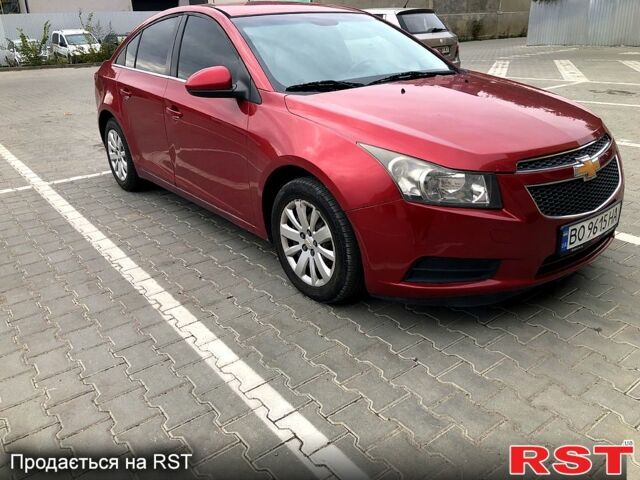 Красный Шевроле Круз, объемом двигателя 1.4 л и пробегом 235 тыс. км за 6400 $, фото 1 на Automoto.ua