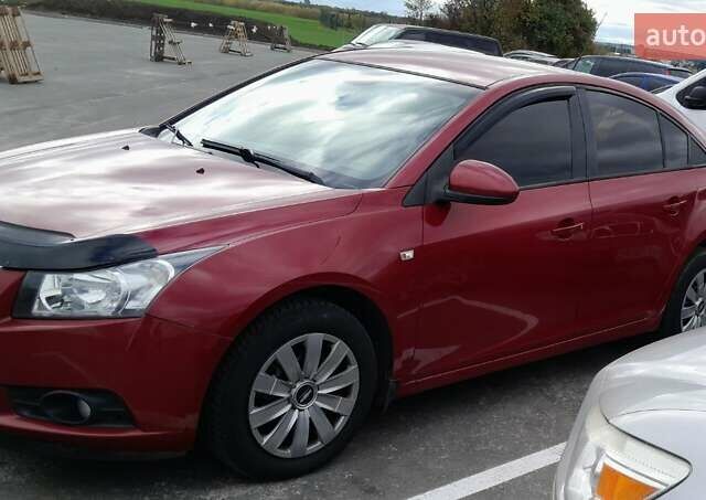 Красный Шевроле Круз, объемом двигателя 1.6 л и пробегом 202 тыс. км за 6400 $, фото 1 на Automoto.ua