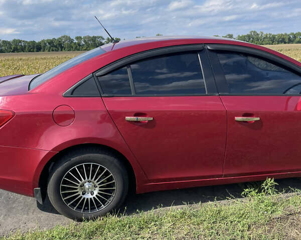 Красный Шевроле Круз, объемом двигателя 1.99 л и пробегом 181 тыс. км за 9000 $, фото 6 на Automoto.ua