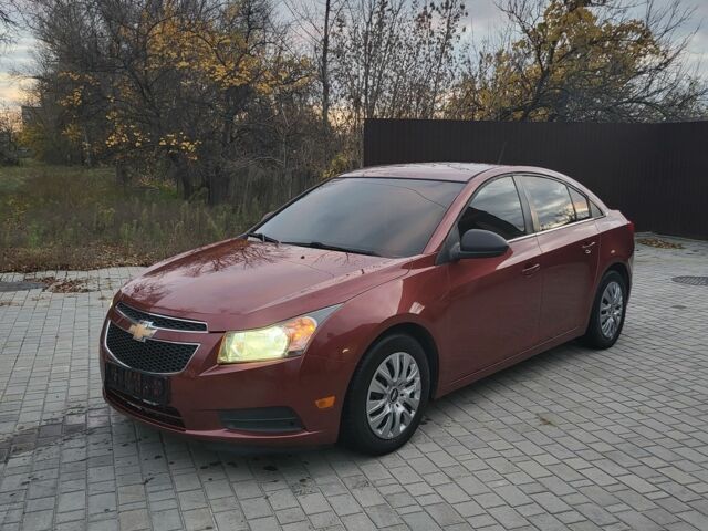 Красный Шевроле Круз, объемом двигателя 1.8 л и пробегом 174 тыс. км за 6300 $, фото 1 на Automoto.ua