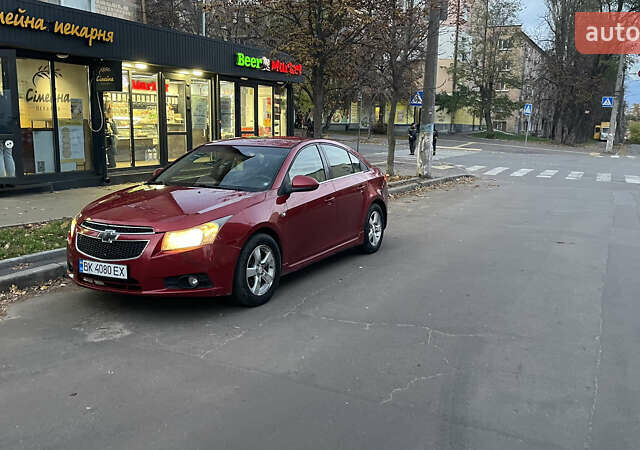 Красный Шевроле Круз, объемом двигателя 1.36 л и пробегом 204 тыс. км за 5399 $, фото 1 на Automoto.ua