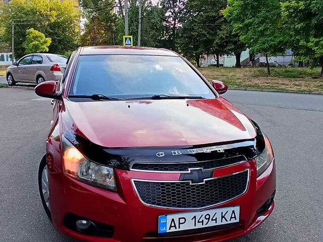 Красный Шевроле Круз, объемом двигателя 1.8 л и пробегом 176 тыс. км за 6800 $, фото 6 на Automoto.ua