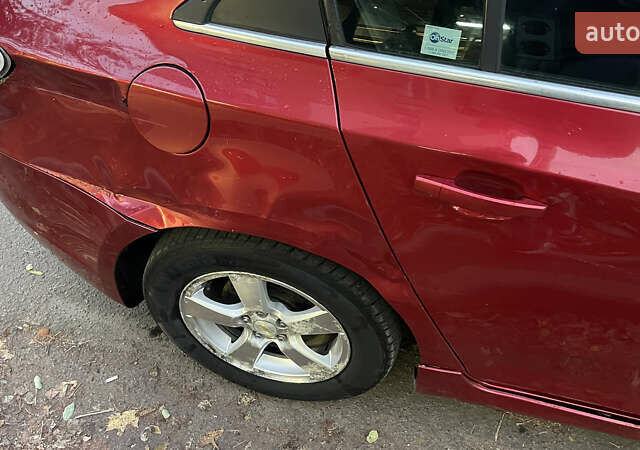 Красный Шевроле Круз, объемом двигателя 1.36 л и пробегом 204 тыс. км за 5399 $, фото 7 на Automoto.ua