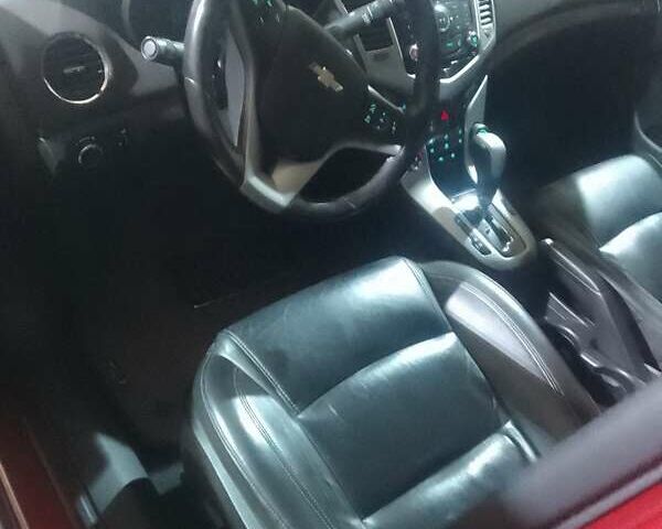 Красный Шевроле Круз, объемом двигателя 1.36 л и пробегом 142 тыс. км за 7200 $, фото 4 на Automoto.ua