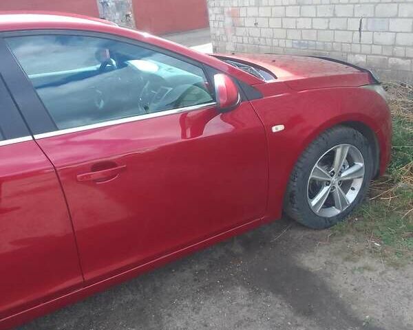 Красный Шевроле Круз, объемом двигателя 1.36 л и пробегом 142 тыс. км за 7200 $, фото 7 на Automoto.ua