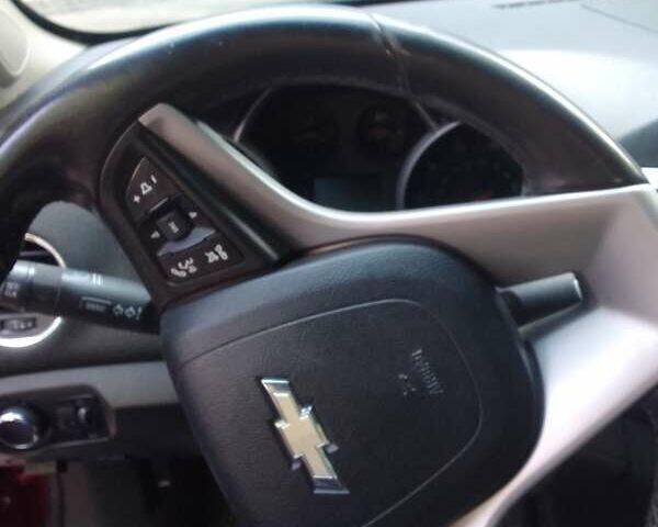 Красный Шевроле Круз, объемом двигателя 1.36 л и пробегом 142 тыс. км за 7200 $, фото 22 на Automoto.ua