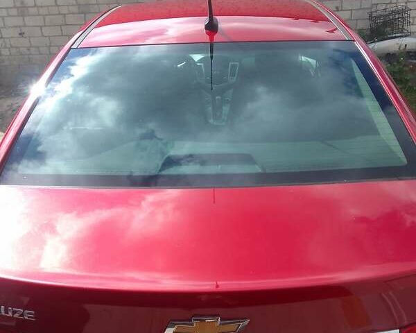 Красный Шевроле Круз, объемом двигателя 1.36 л и пробегом 142 тыс. км за 7200 $, фото 21 на Automoto.ua