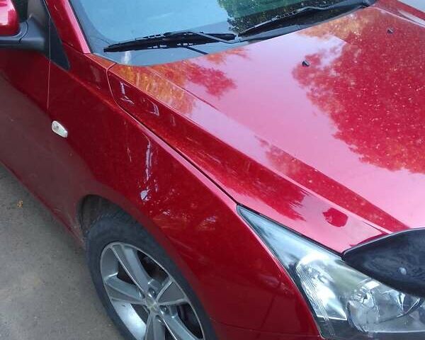 Красный Шевроле Круз, объемом двигателя 1.36 л и пробегом 142 тыс. км за 7200 $, фото 14 на Automoto.ua