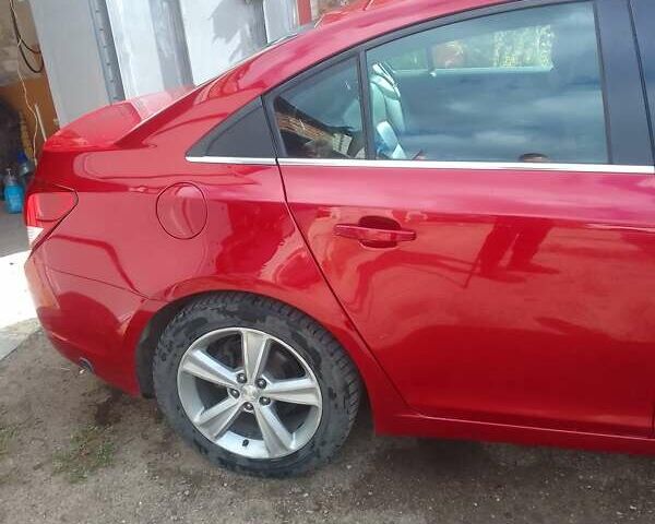 Красный Шевроле Круз, объемом двигателя 1.36 л и пробегом 142 тыс. км за 7000 $, фото 7 на Automoto.ua