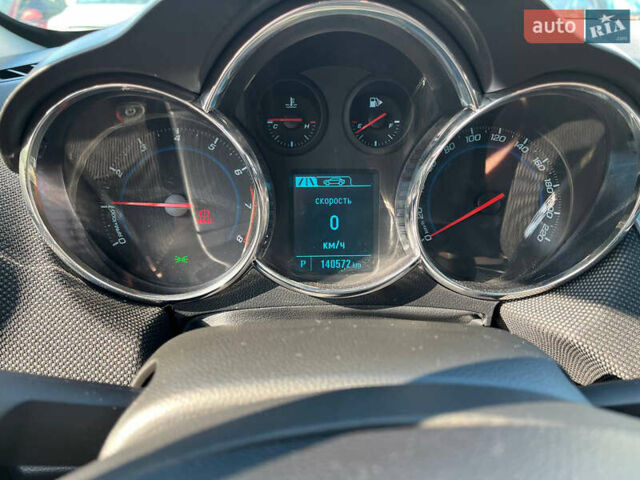 Красный Шевроле Круз, объемом двигателя 1.8 л и пробегом 142 тыс. км за 7500 $, фото 5 на Automoto.ua