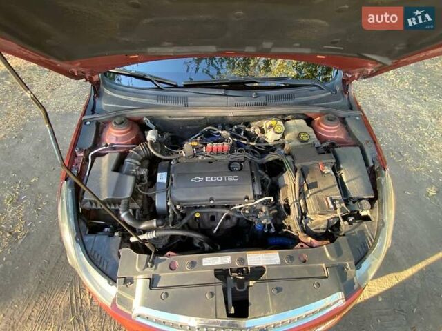 Красный Шевроле Круз, объемом двигателя 1.8 л и пробегом 180 тыс. км за 6800 $, фото 10 на Automoto.ua