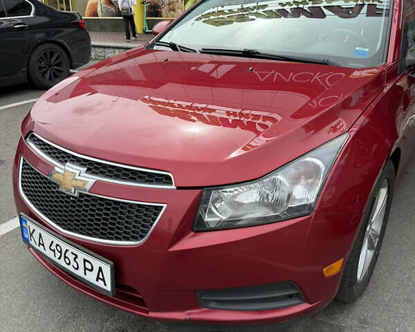 Красный Шевроле Круз, объемом двигателя 1.36 л и пробегом 220 тыс. км за 7500 $, фото 1 на Automoto.ua
