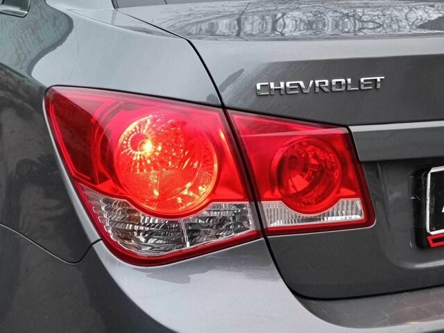 Сірий Шевроле Круз, об'ємом двигуна 1.8 л та пробігом 221 тис. км за 6690 $, фото 9 на Automoto.ua