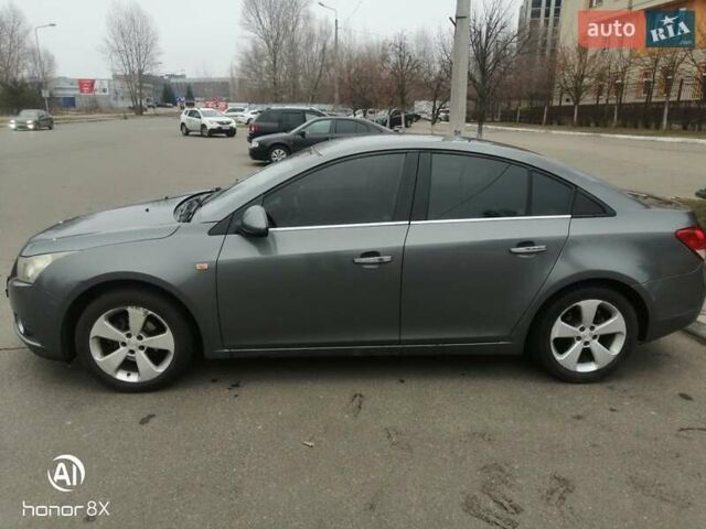 Серый Шевроле Круз, объемом двигателя 1.8 л и пробегом 204 тыс. км за 6300 $, фото 1 на Automoto.ua