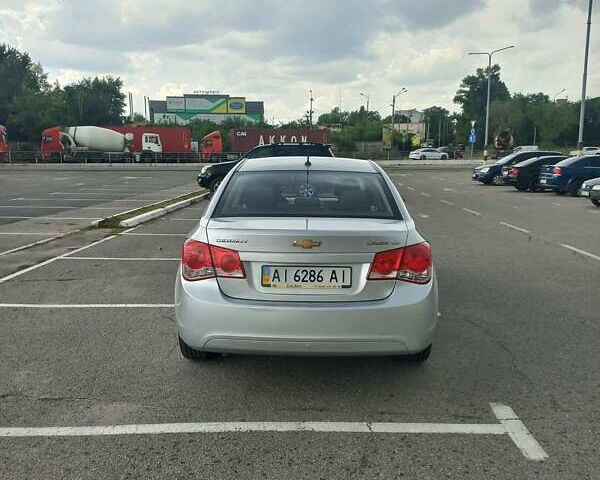 Серый Шевроле Круз, объемом двигателя 1.8 л и пробегом 270 тыс. км за 6800 $, фото 7 на Automoto.ua