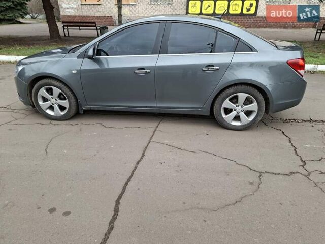 Серый Шевроле Круз, объемом двигателя 1.8 л и пробегом 143 тыс. км за 6000 $, фото 4 на Automoto.ua