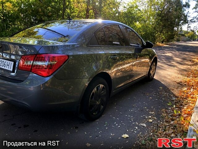 Серый Шевроле Круз, объемом двигателя 1.8 л и пробегом 236 тыс. км за 7500 $, фото 5 на Automoto.ua