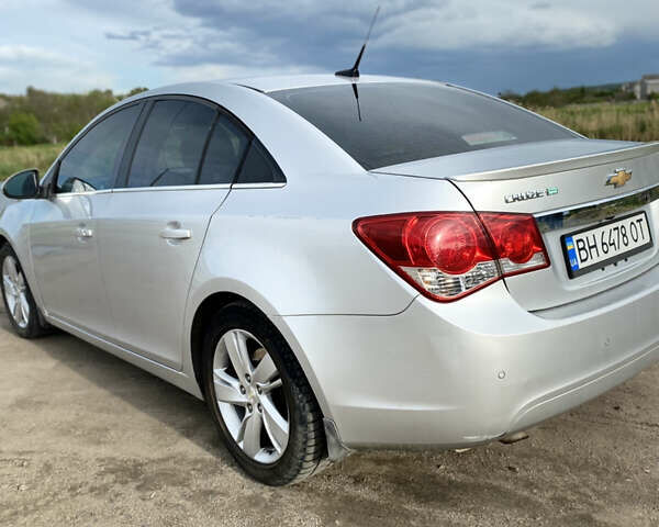 Сірий Шевроле Круз, об'ємом двигуна 2 л та пробігом 190 тис. км за 6800 $, фото 9 на Automoto.ua