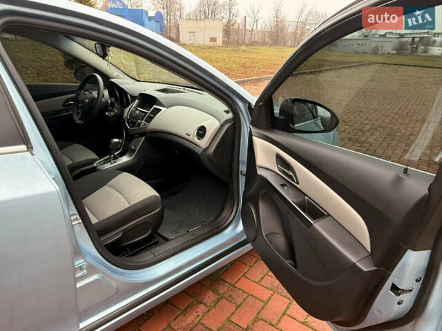 Синий Шевроле Круз, объемом двигателя 1.8 л и пробегом 249 тыс. км за 6600 $, фото 25 на Automoto.ua