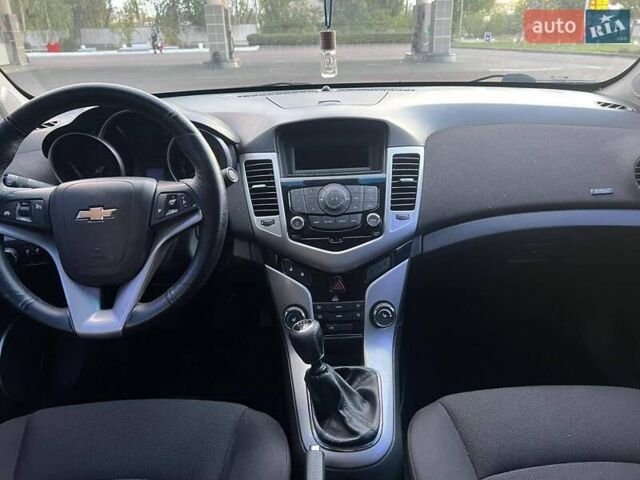 Синий Шевроле Круз, объемом двигателя 1.8 л и пробегом 127 тыс. км за 7500 $, фото 1 на Automoto.ua