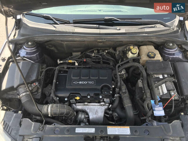 Синий Шевроле Круз, объемом двигателя 1.4 л и пробегом 230 тыс. км за 7500 $, фото 19 на Automoto.ua