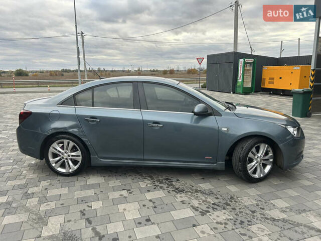 Синий Шевроле Круз, объемом двигателя 1.36 л и пробегом 280 тыс. км за 6500 $, фото 9 на Automoto.ua