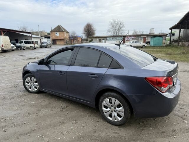 Синий Шевроле Круз, объемом двигателя 1.8 л и пробегом 212 тыс. км за 5600 $, фото 4 на Automoto.ua