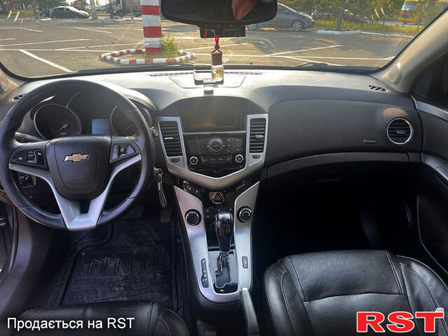 Синий Шевроле Круз, объемом двигателя 1.4 л и пробегом 228 тыс. км за 5500 $, фото 6 на Automoto.ua