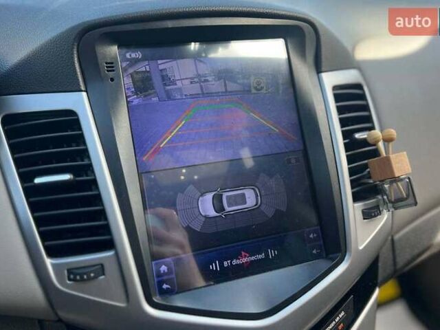 Синий Шевроле Круз, объемом двигателя 1.8 л и пробегом 125 тыс. км за 7500 $, фото 19 на Automoto.ua