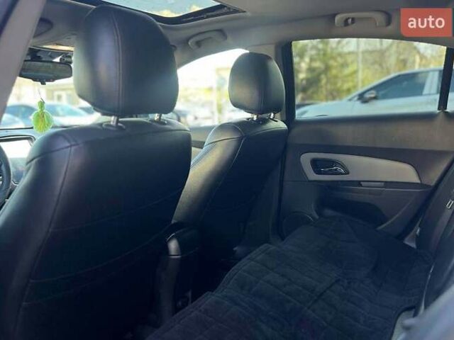 Синий Шевроле Круз, объемом двигателя 1.8 л и пробегом 125 тыс. км за 7500 $, фото 27 на Automoto.ua