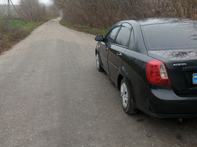 Черный Шевроле Другая, объемом двигателя 1.8 л и пробегом 230 тыс. км за 3400 $, фото 11 на Automoto.ua