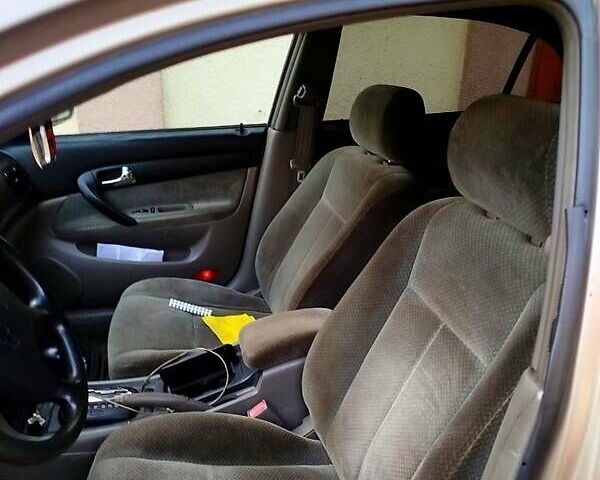 Бежевий Шевроле Епіка, об'ємом двигуна 2 л та пробігом 250 тис. км за 3500 $, фото 4 на Automoto.ua