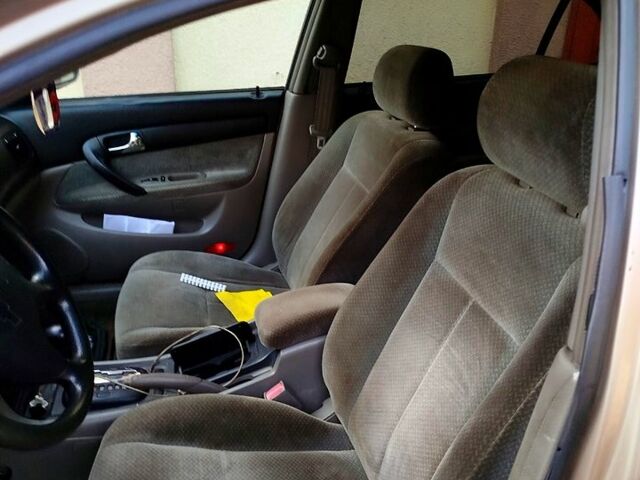 Бежевий Шевроле Епіка, об'ємом двигуна 2 л та пробігом 250 тис. км за 3500 $, фото 5 на Automoto.ua