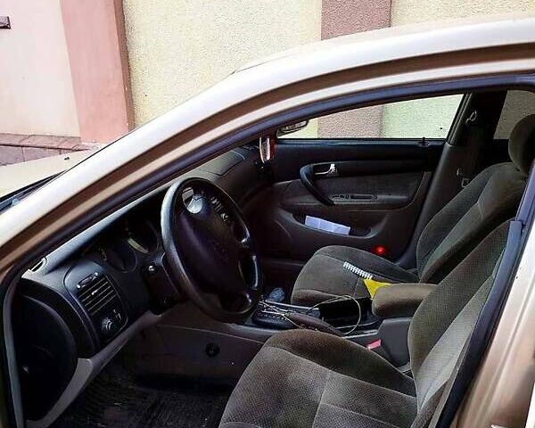 Бежевий Шевроле Епіка, об'ємом двигуна 2 л та пробігом 250 тис. км за 3500 $, фото 3 на Automoto.ua