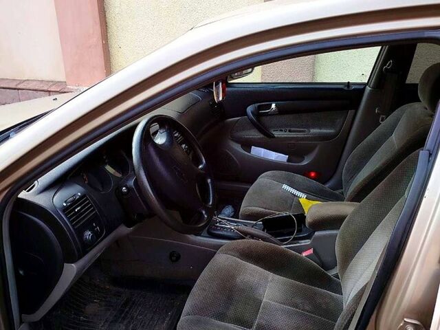 Бежевий Шевроле Епіка, об'ємом двигуна 2 л та пробігом 250 тис. км за 3500 $, фото 4 на Automoto.ua