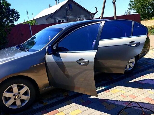 Бежевий Шевроле Епіка, об'ємом двигуна 2 л та пробігом 155 тис. км за 6000 $, фото 2 на Automoto.ua